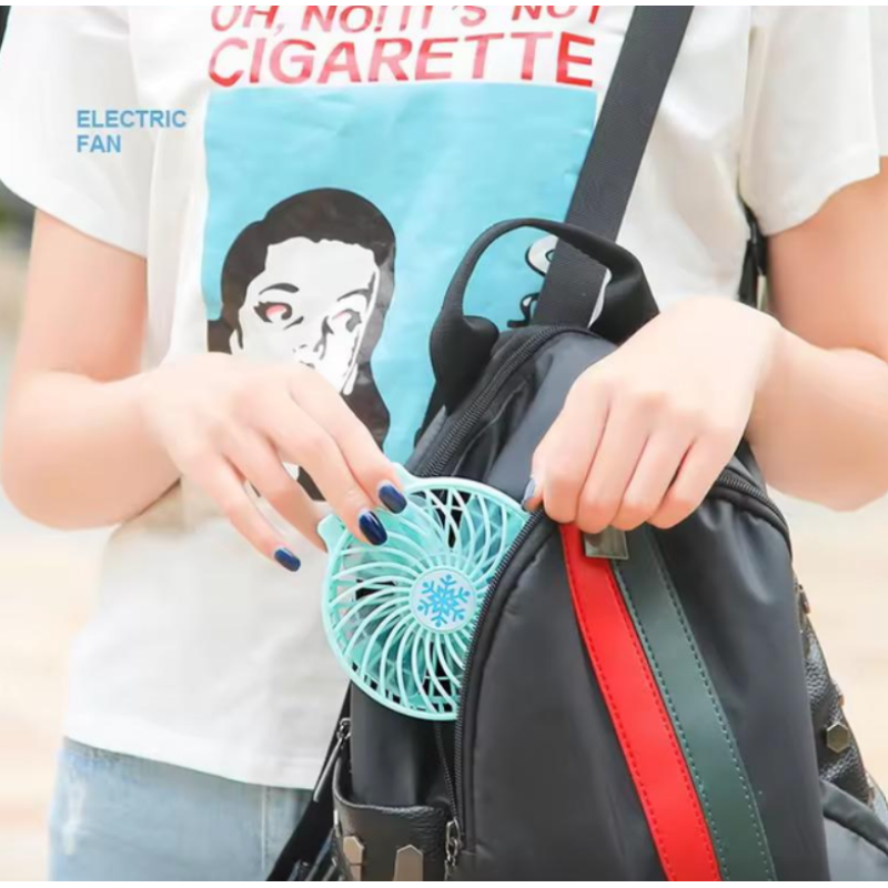 Ручний міні вентилятор на батарейках 3 швидкості Rapid Cooling (RP-12852) Ручний міні вентилятор на батарейках 3 швидкості Rapid Cooling (RP-12852)