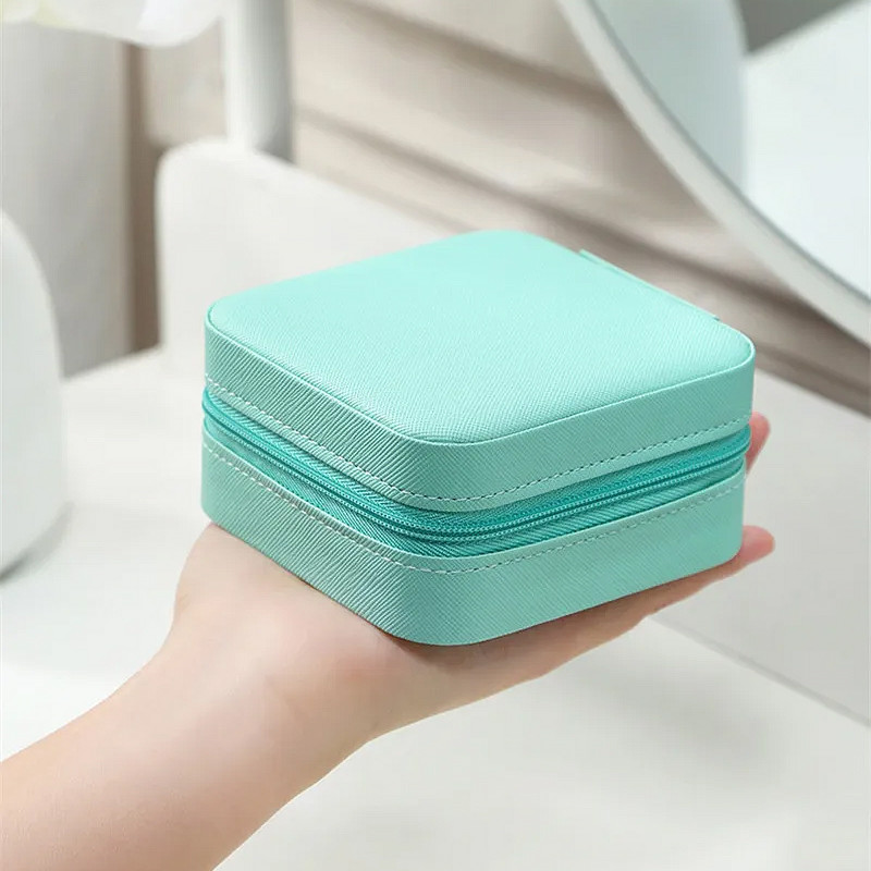 Портативна скринька 10*10*5 см для прикрас і ювелірних виробів зі штучної шкіри Casegrace SP-01212 Turquoise Портативна скринька 10*10*5 см для прикрас і ювелірних виробів зі штучної шкіри Casegrace SP-01212 Turquoise