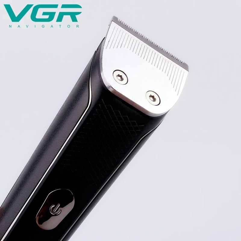 Бездротова машинка триммер для стрижки волосся та бороди акумуляторний з насадками VGR V-021 Black Бездротова машинка триммер для стрижки волосся та бороди акумуляторний з насадками VGR V-021 Black